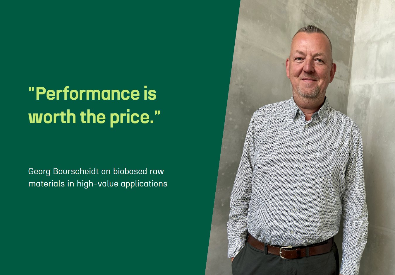 Georg Bourscheidt by a concrete wall, next to a green panel with the quote Performance is worth the price.